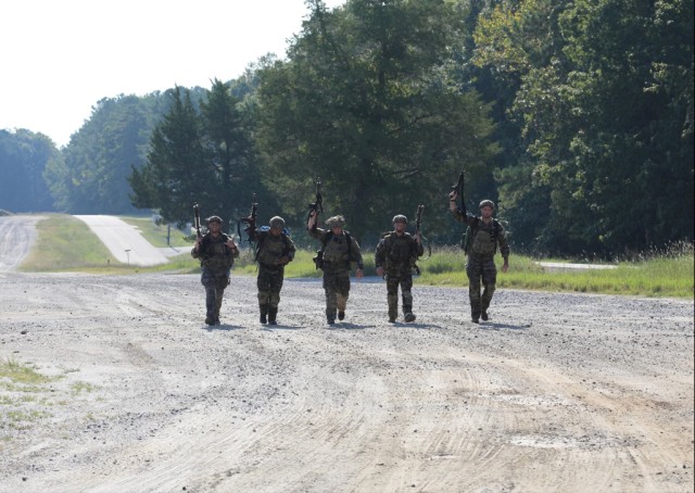 The 75th Ranger Regiment team finishes the final event of the Ammunition Transfer Holding Point (ATHP) Team of the Year event at Ft. Pickett, Virginia