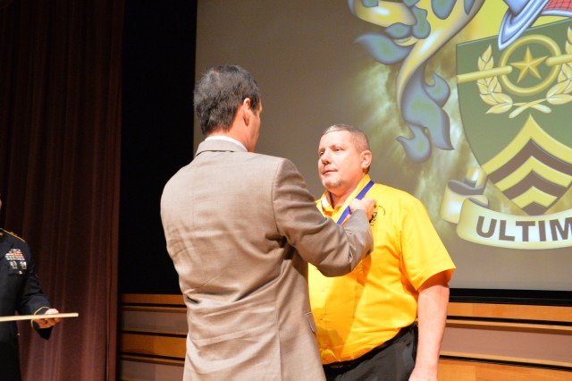 Houck receives the Order of Saint Michael, Sept. 6