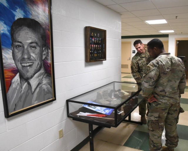 Triple Deuce Soldiers, guests honor fallen warrior at building re-dedication ceremony