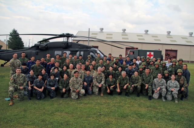 Japan, U.S. Medics tackle realistic combat casualty care