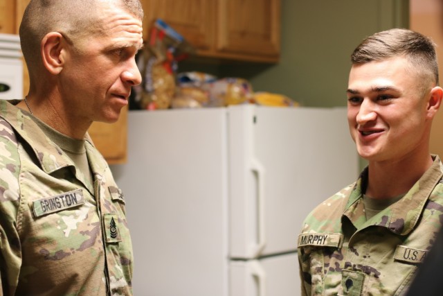 Sgt. Major of the Army Micheal A. Grinston visits 1st Theater Sustainment Command barracks
