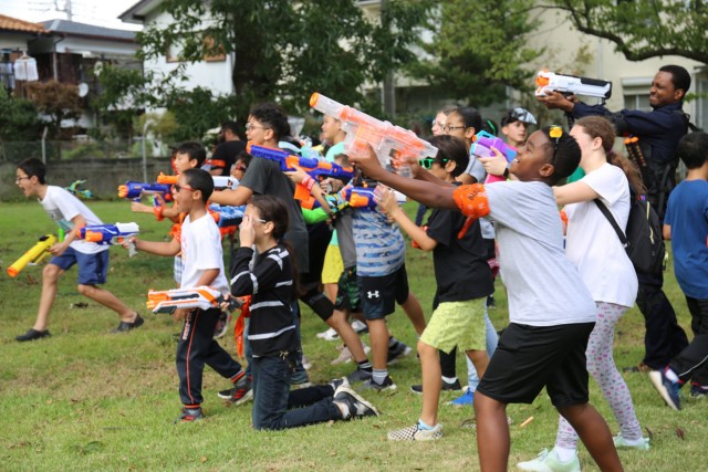 Camp Zama youth evade hordes of undead at 'Humans vs. Zombies' community event