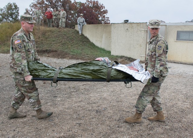 Exercise on the range: Fort Leonard Wood Combat Training Company medics practice for worst-case scenario