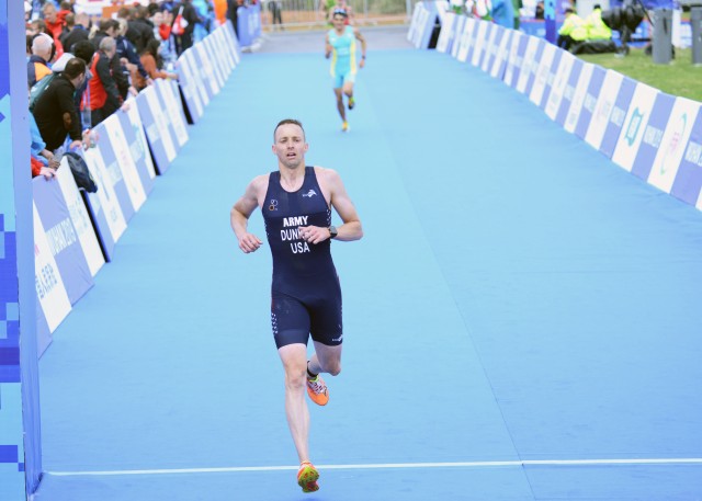Doyle crosses triathlon finish
