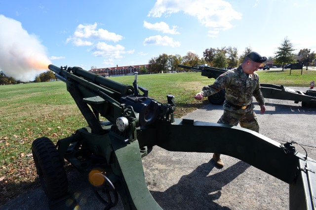 Fort Knox salutes 100th Training Division's Walter while embracing McLaughlin at change of command