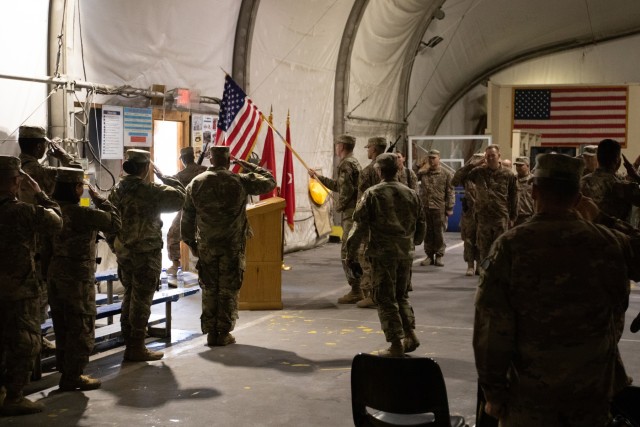 U.S. Army Soldiers salute the American flag