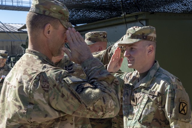 10th Mountain CG promotes Soldiers during training exercise