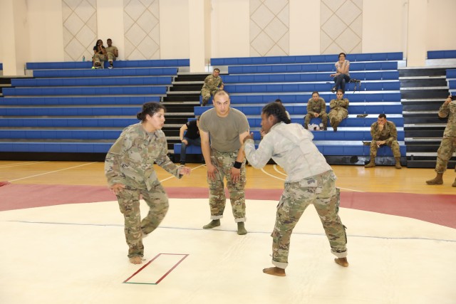 Tournament's Two Females Square-off during the Red Dragon Royal Rumble Combatives Tournament