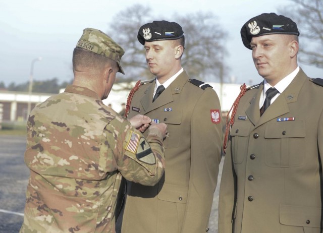 1st Cavalry Division's 'Blackjack Brigade' builds relations Blackjack 6 presents Polish Soldiers with Army Achievement Medal