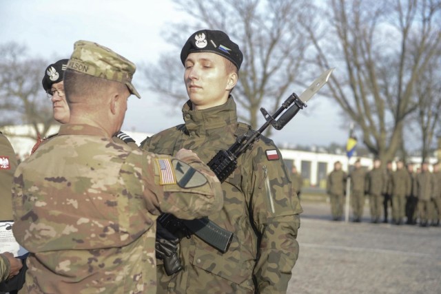 1st Cavalry Division's 'Blackjack Brigade' builds relations Blackjack 6 presents Polish Soldiers with Army Achievement Medal