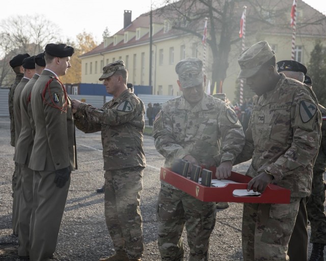 1st Cavalry Division's 'Blackjack Brigade' builds relations Blackjack 6 presents Polish Soldiers with Army Achievement Medal
