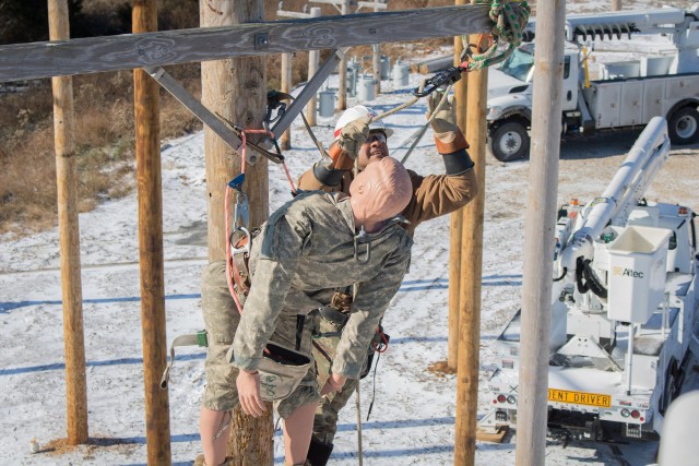 Prime Power Soldiers make the climb at FLW Lineman's Rodeo