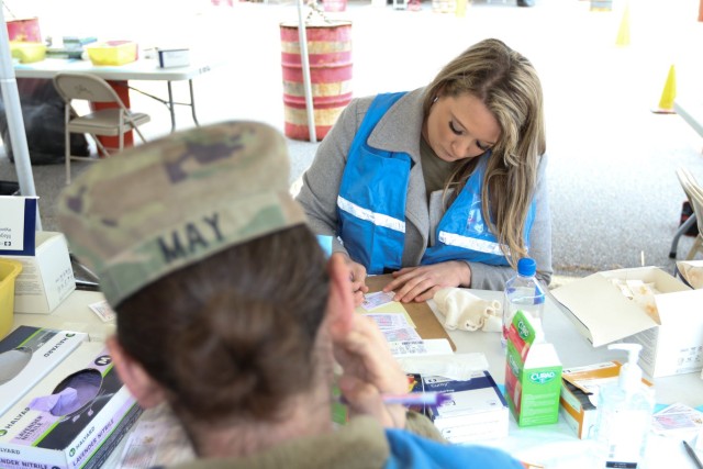 Winn touts flu-drive thru, a community success