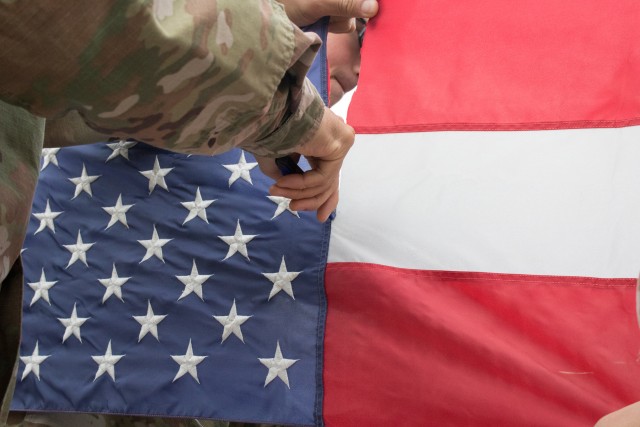 Engineers, Cub Scouts perform flag retirement ceremony