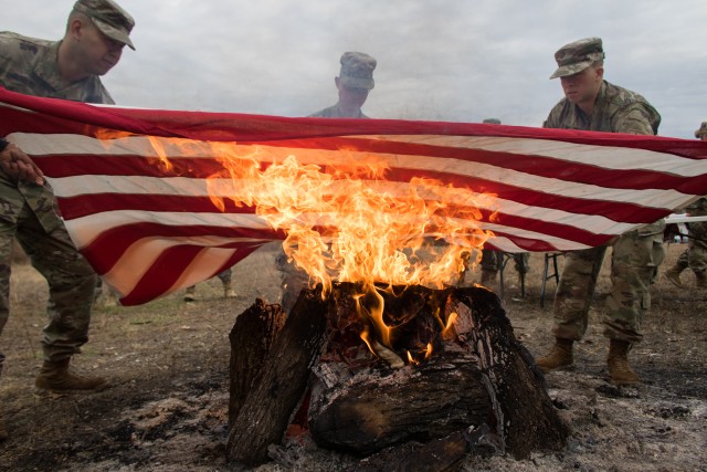 Engineers, Cub Scouts perform flag retirement ceremony
