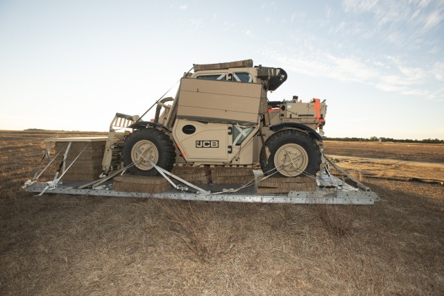 82nd Airborne Soldiers test forklift after cargo aircraft airdrop