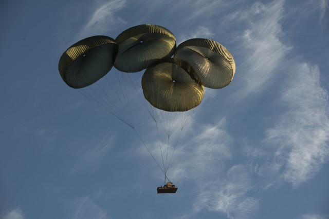 82nd Airborne Soldiers test forklift after cargo aircraft airdrop