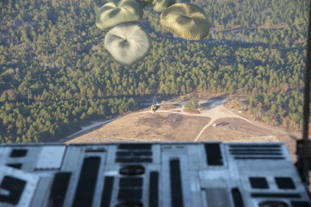 82nd Airborne Soldiers test forklift after cargo aircraft airdrop