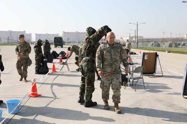 501st Military Intelligence Brigade Soldiers Go Through Decon Process During CBRN Training