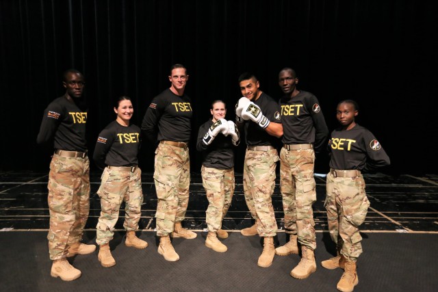 Installation Management Command's outgoing Command Sergeant Major spars with World Class Athlete Program Soldier-athlete