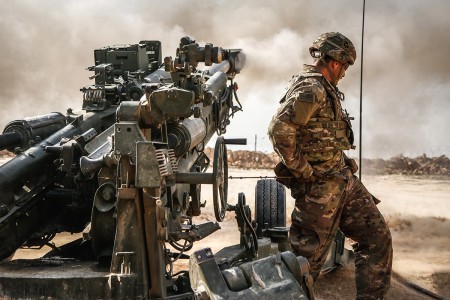 A 101st Airborne Division Soldier pulls the lanyard on an M777A2 howitzer during a fire mission in Southwest Asia, Jan. 26, 2019. The 101st Airborne Division deployed in support of Operation Inherent Resolve, working with the ISF and Coalition partners to defeat ISIS in areas of Iraq and Syria. (U.S. Army photo by Spc. Gyasi Thomasson)