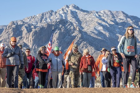 Col. Ben Skardon, a 1938 graduate of Clemson University, WWII POW, recipient of two Silver Stars, and survivor of the Bataan Death March, walks in the Bataan Memorial Death March at White Sands Missile Range, N.M., March 17, 2019. He is 101 years old, and the only survivor of the actual death march to walk in the memorial march. After he retired from the Army, he came back to Clemson and taught English until his retirement in 1982. A group of his former students, Family members, ROTC cadets, and relatives of men he served with called &#34;Ben&#39;s Brigade&#34; walk with him. (Photo by Ken Scar)