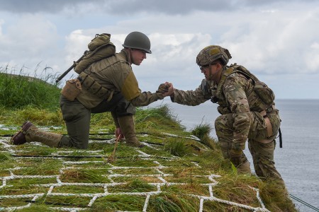 U.S. Soldiers with 75th Ranger Regiment scale the cliffs like Rangers did during Operation Overload 75 years ago at Omaha Beach, Pointe du Hoc, Normandy, France, June 5, 2019. More than 1,300 U.S. Service Members, partnered with 950 troops from across Europe and Canada, converged in northwestern France to commemorate the 75th anniversary of Operation Overlord, the WWII Allied invasion of Normandy, commonly known as D-Day. (U.S. Army photo by Markus Rauchenberger)