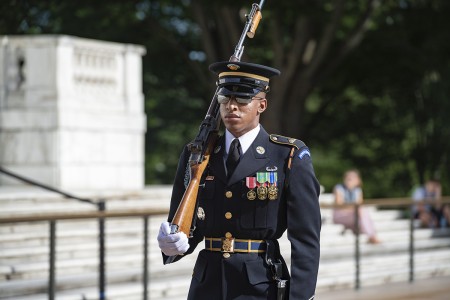 A sentinel from the 3d U.S. Infantry Regiment (The Old Guard) walks the mat at the Tomb of the Unknown Soldier, Arlington National Cemetery, Arlington, Va., July 1, 2019. (U.S. Army photo by Elizabeth Fraser)