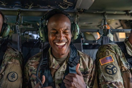 A Soldier with the Tennessee Army National Guard&#39;s 278th Armored Cavalry Regiment, celebrates his reenlistment after swearing in a UH-60 Black Hawk, 200 feet above Tullahoma, Tenn., Aug. 20, 2019. (U.S. Army photo by Sgt. Sarah Kirby)