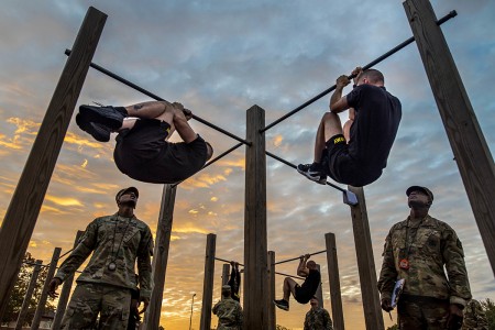 The top command sergeants major from across the U.S. Army Reserve perform the leg tuck for a practice Army Combat Fitness Test at Fort Eustis, Va., Oct. 25, 2019, during the Army Reserve Senior Enlisted Council. During the workshop the enlisted leaders conducted a practice ACFT as they lead the effort to implement the new test over the next 12 months before it becomes the official fitness test of record across the U.S. Army. (U.S. Army Reserve photo by Master Sgt. Michel Sauret)