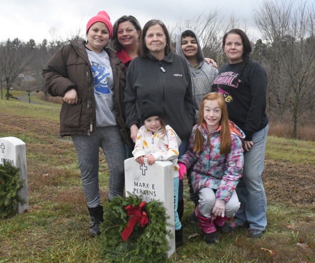 Volunteers honor military veterans with wreaths at Fort Knox Main Post Cemetery, Kentucky Veterans Cemetery -- Central