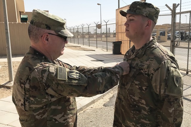 Signal officer connects troops in the Middle East