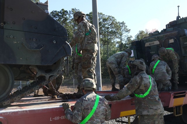 Soldiers load vehicles at RMA