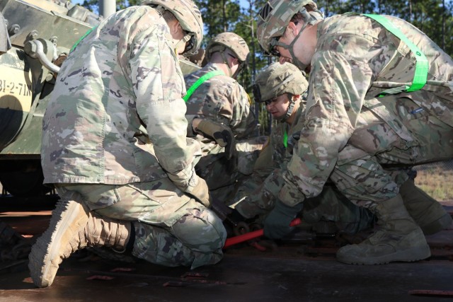 Soldiers load vehicles at RMA