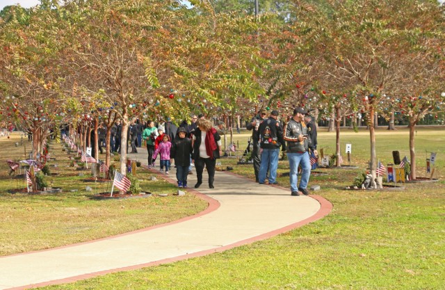 Wreaths for Warriors Walk; solemn honor on hallowed ground marks sacrifices of the Fallen, sacrifices of their Families