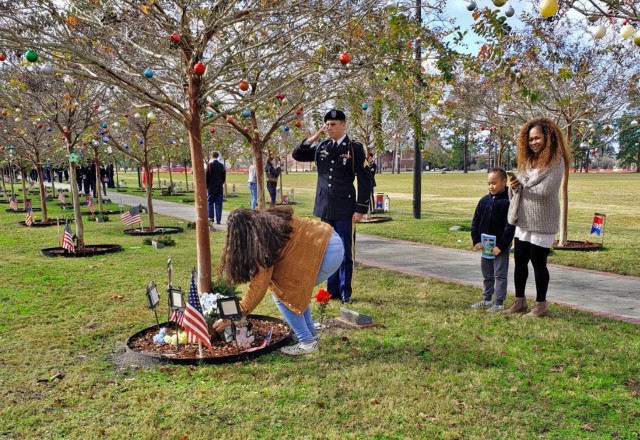 Wreaths for Warriors Walk; solemn honor on hallowed ground marks sacrifices of the Fallen, sacrifices of their Families
