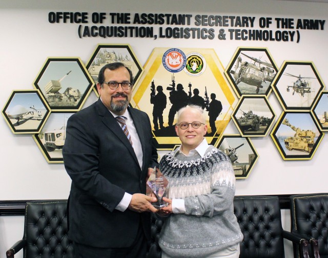 Dr. Perconti (left) presents Dr. VanMil (right) with Mentor of Year Award