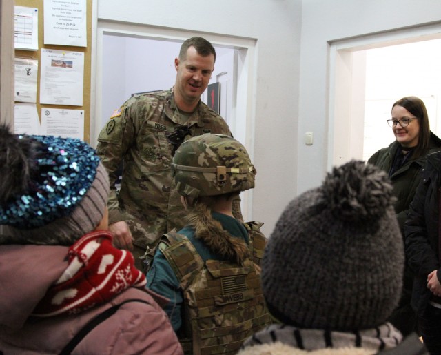 1st Infantry Division Forward hosts local children to visit base, meet Soldiers