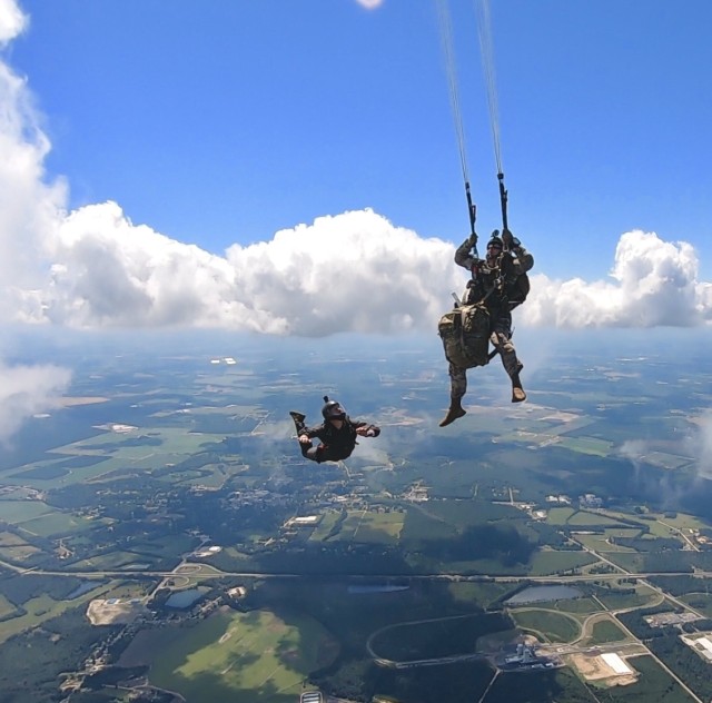 Airborne test jumpers apply risk reduction tests before equipment tests ...