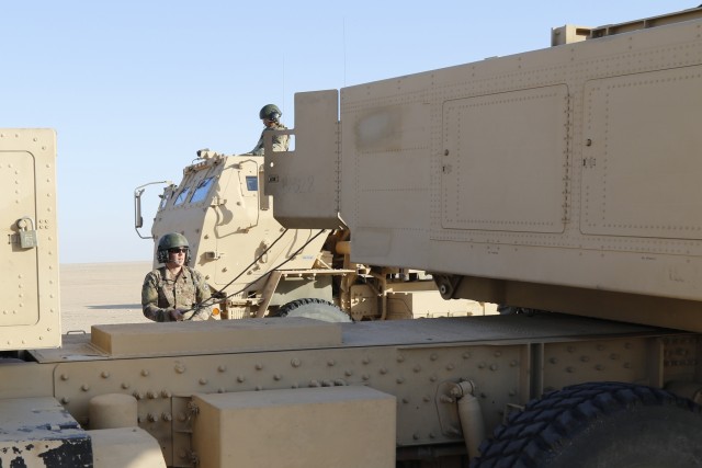 U.S, Kuwait artillery light up the night sky