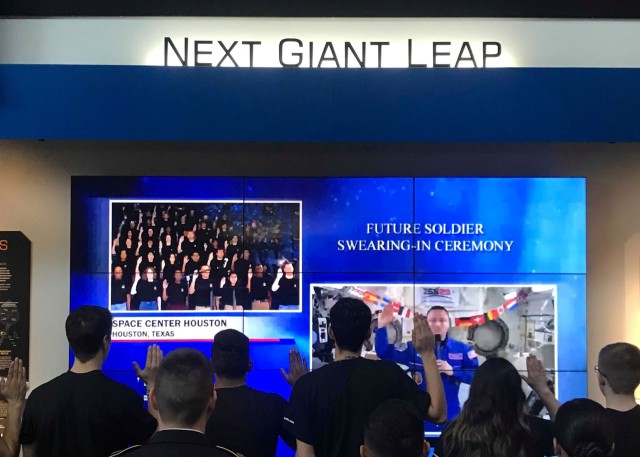 Future service members sworn in by astronaut