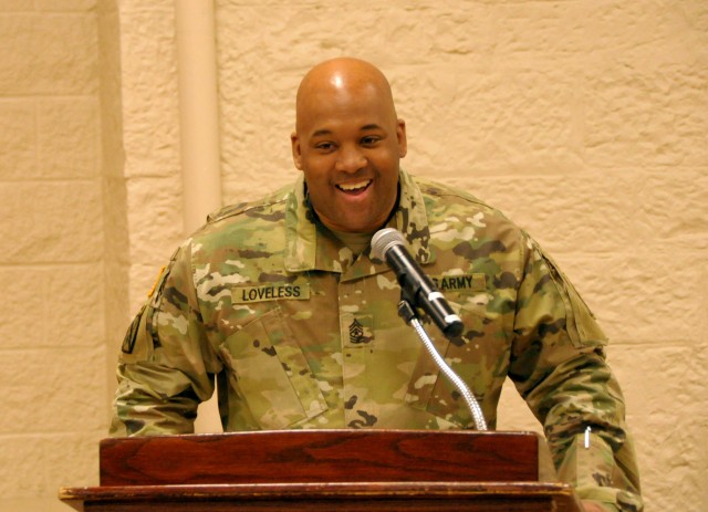Sgt. Maj. Wyman Loveless, First Army Chief of Religious Affairs NCO, shares a laugh with the audience during the Rock Island Arsenal Black History Month observance on Feb. 26.