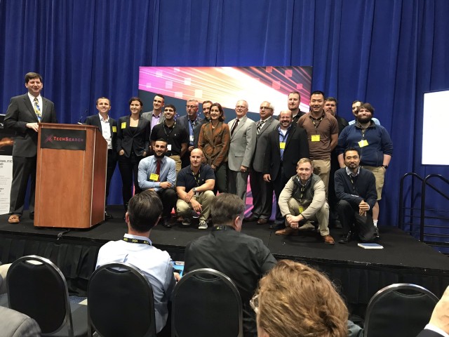 Army Acquisition Executive poses with xTechSearch Contestants