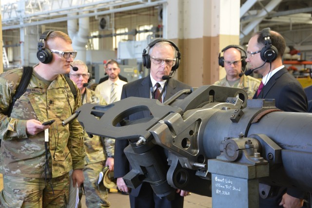 Bruce Jette, center, the Army&#39;s acquisition chief, receives a briefing at Army Benet Laboratories in Watervliet Arsenal, N.Y., May 8, 2018. Jette told lawmakers during a hearing March 5, 2020, that the Army requires sufficient, predictable, sustained and timely funding to build on the momentum of its modernization efforts.