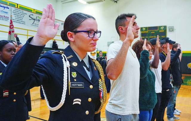 Trinity Hoffman, major of the MacArthur High School JROTC battalion, is among the first in the country to take the oath of enlistment from a U.S. Army colonel who's an astronaut abroad the International Space Station.