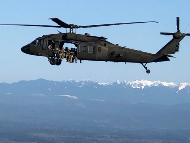 2-158 AHB Drops in SOF Soldiers During Training Exercise at JBLM