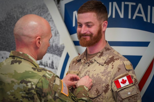 Capt. Alexander Buck, of the Canadian Army, promotes to major.