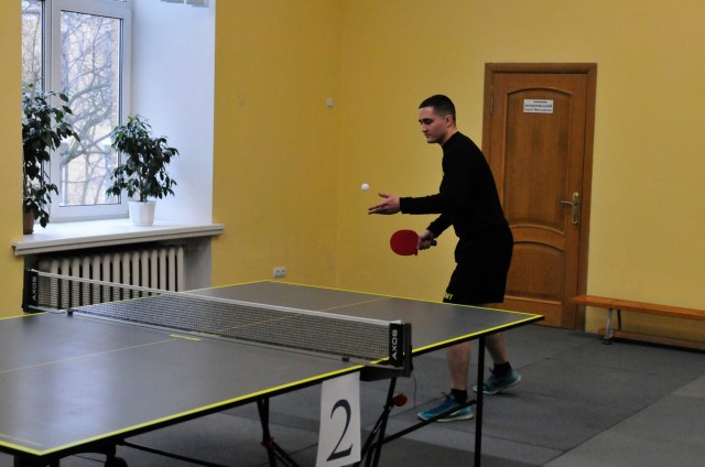 United States Soldier Specialist Jackson Knott, a Combat Medic with Task Force – Juvigny, 32nd Infantry Brigade Combat Team, competes against Master Corporal Helen Lam, a Canadian Soldier and Op UNIFIER advisor, in Table Tennis during the 11th...