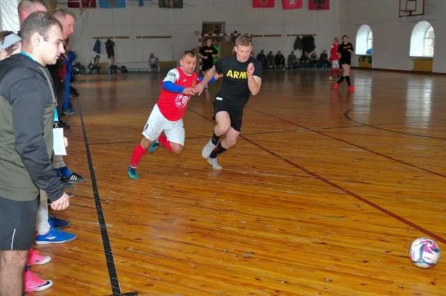 Soldiers from Task Force – Juvigny, 32nd Infantry Brigade Combat Team, compete against a Ukrainian Futsal Team in Futsal during the 11th annual Kyiv Games in Kyiv, Ukraine, 12 Feb. 2020. TF – Juvigny’s Futsal team participated in 6 Futsal...