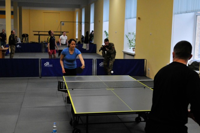 “It’s important to build relationships with other countries,” Master Corporal Helen Lam, a Canadian Armed Forces advisor in Op UNIFIER, says as she competes against Specialist Jackson Knott, a United States Army Combat Medic with Task Force...
